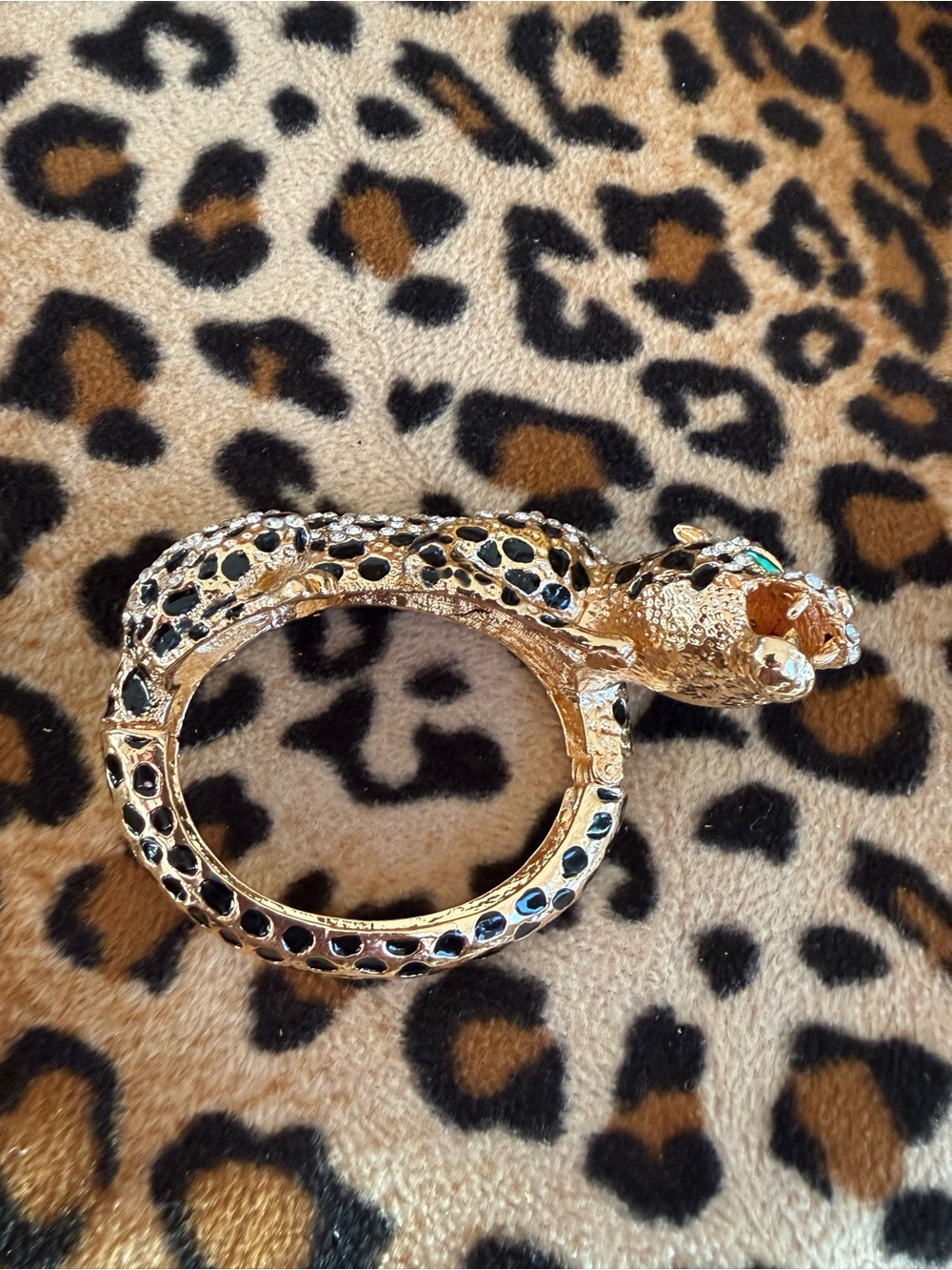 Gold – tone, rhinestone, and enamel, leopard clamper bracelet